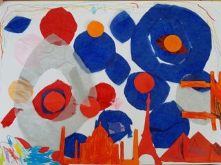 Abstract artwork featuring overlapping blue and red circles with orange accents. Red geometric shapes at the bottom resemble cityscapes. Vibrant and dynamic composition.