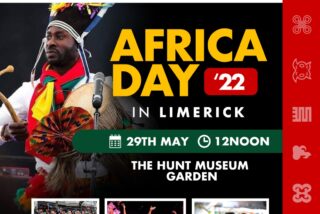 Afrika Day 2022 poster for Limerick event. Features performer in vibrant traditional attire, musical instruments, event details, and logos. Energetic and celebratory.