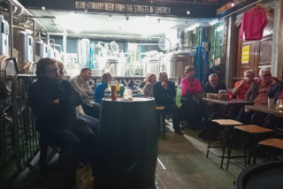 People sitting in a room telling stories